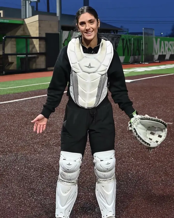 Reagan Glanz in her catcher's gear on a softball field